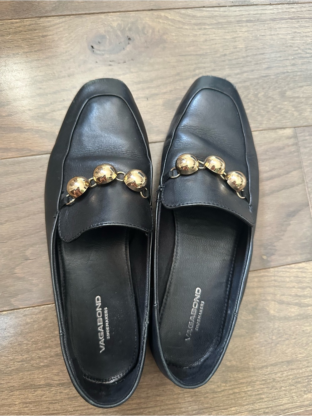 Vagabond Black Leather Loafers with Gold Orb Chain
